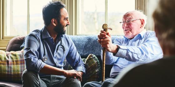 Older man with doctor