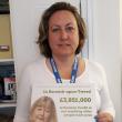 Anne Marie Trevelyan MP, holding our poster